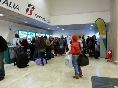 Buying train tickets at a machine in Italy