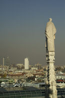 The Madonnina spire above the Duomo terraces