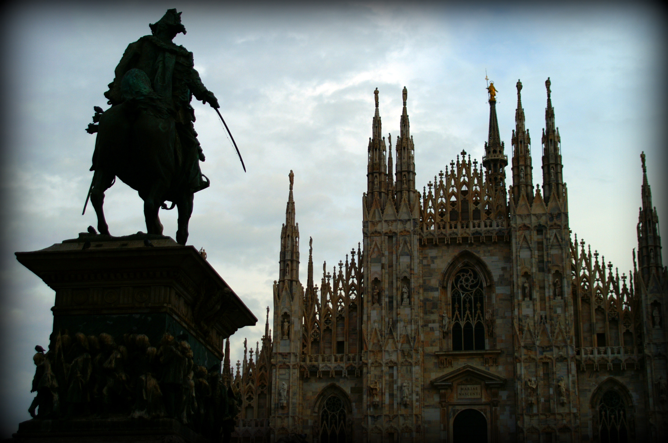 Milan's Duomo behind the statue of Vittorio Emanuele II