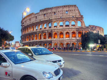 White taxis waiting in Rome