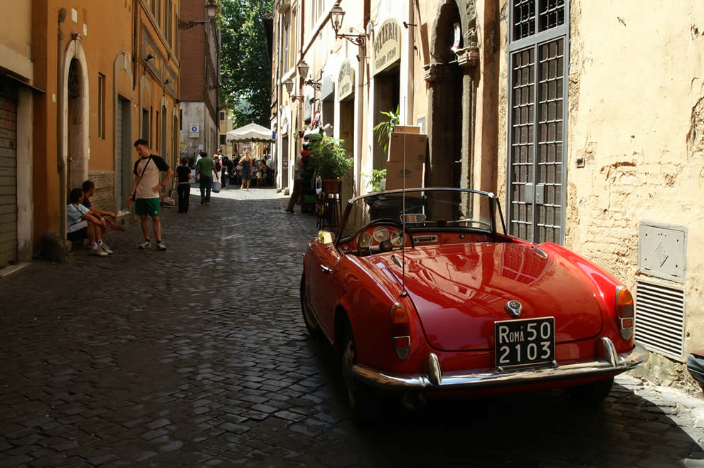 An Alfa Romeo parked in Trastevere